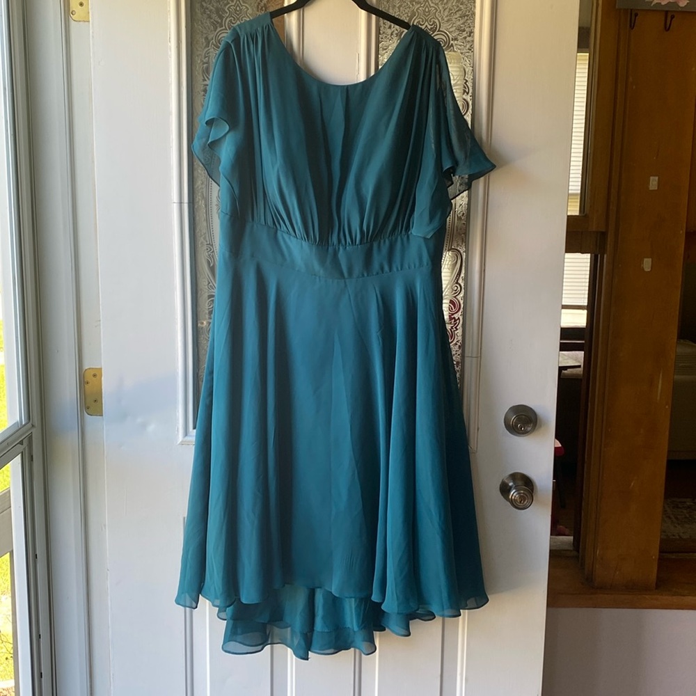 Bridesmaid dress by JJ’s House size 16 in the color  Peacock.